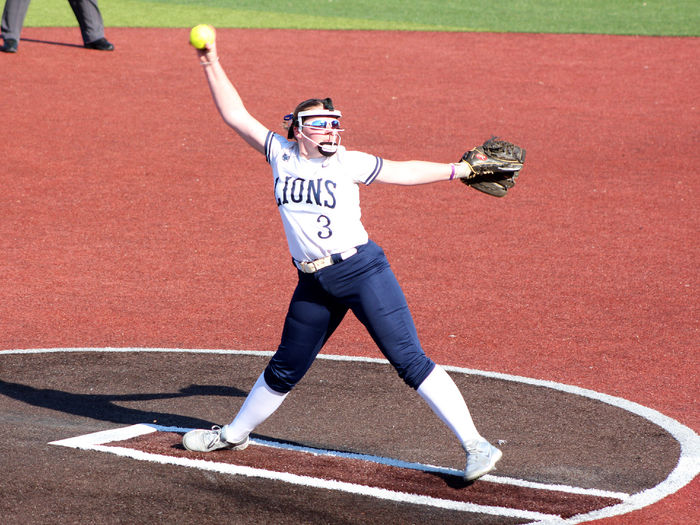 Penn State DuBois sophomore Megan Hyde works through her windup to deliver a pitch home during a recent home game at Heindl Field in DuBois.
