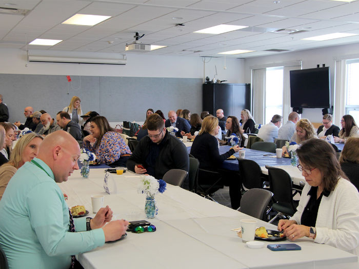 Employers and representatives from Penn State DuBois gather in the DuBois Educational Foundation building for brunch prior to the start of the career fair.