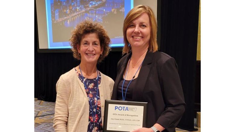 LuAnn Delbrugge with Amy Fatula with her OTA Award of Recognition at the 2022 POTA conference.