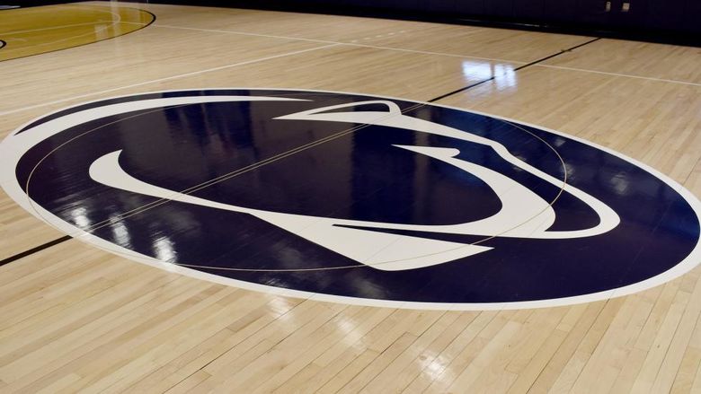The Nittany Lion logo at center court on the basketball floor at the PAW Center on the campus of Penn State DuBois