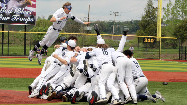 The Penn State DuBois baseball teams celebrates their PSUAC championship with a dogpile near the pitcher’s mound at Showers Field in DuBois.