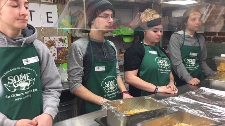 Students volunteering at one of the lunch shifts with SOME (So Others Might Eat) in Washington DC. 