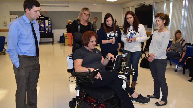 Melissa Davis from Laurel Medical Solutions demonstrates the use of a wheelchair equipped with Eye Gaze technology.