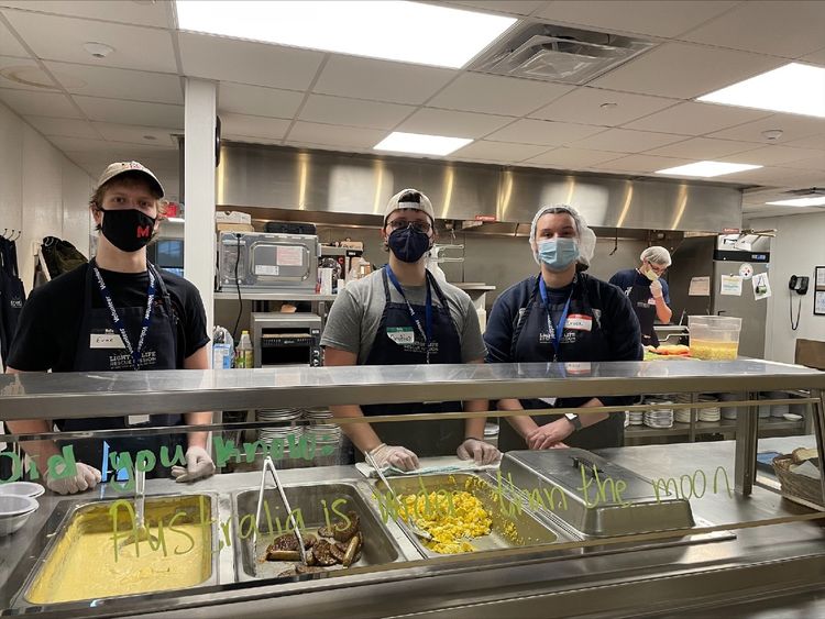 Students serve meals at a Pittsburgh area mission