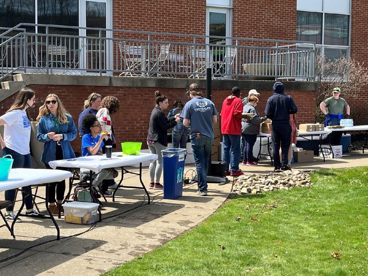 Students and community collaborate on the DEF lawn for an Earth Day celebration