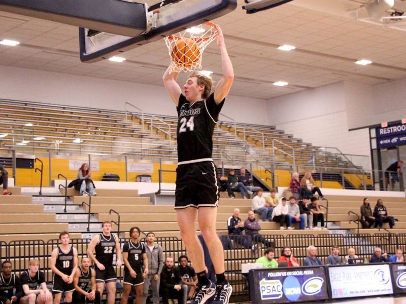 Penn State DuBois senior forward Beau Verdill slams the ball home during a drive in the lane in the second half of the team’s game at Clarion University on Nov. 26.