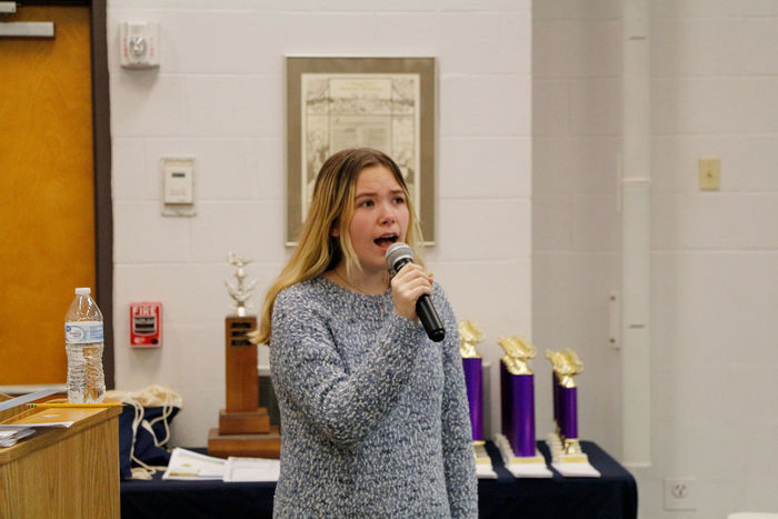 Clearfield Area High School student and competitor Sage Hoppe performs the national anthem at the senior scholastic challenge, hosted at Penn State DuBois