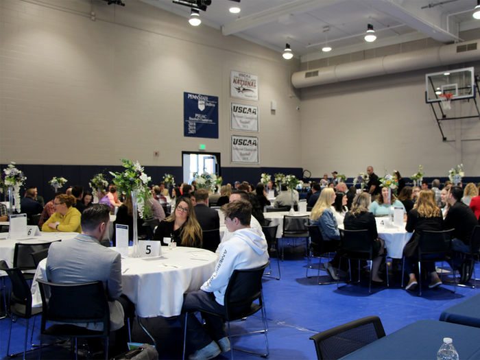 Students and employers share tables and conversation during the networking luncheon and career fair at Penn State DuBois