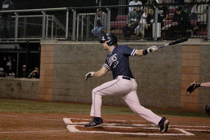 Penn State DuBois senior Cory Lehman follows through with his swing for a hit during the USCAA championship tournament game against Penn State Mont Alto