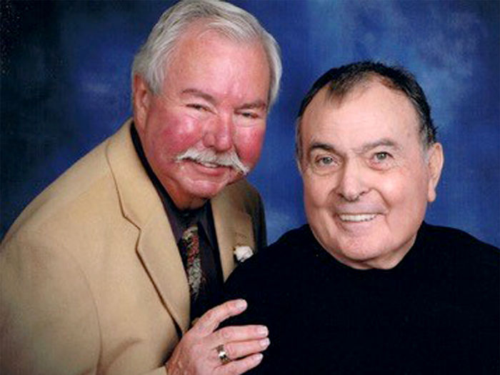 A 2011 portrait of Ted M. Mckinney, left, and Frank A. Palmerino, right.