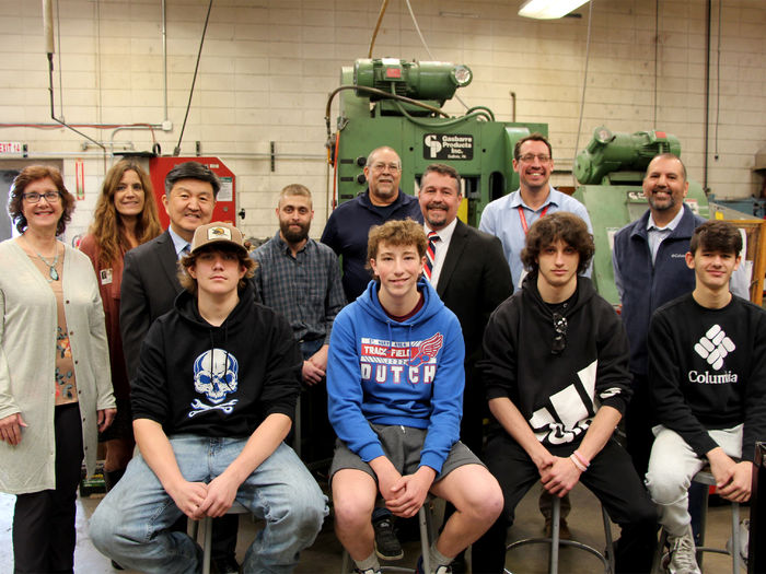 Representatives from Penn State DuBois, Workforce Solutions for North Central Pennsylvania and the Saint Marys Area School District, including the first class of students, who are part of the first offering of the high school die setter program come together for a group photo.