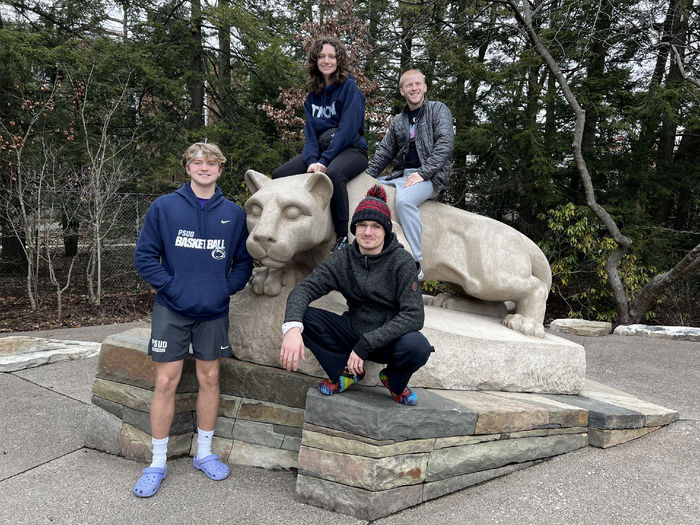 Dancer representing Penn State DuBois pictured with the Nittany Lion shrine at the University Park Campus. Bottom row left to right: Jalen Kosko, Gaven Wolfgang. Top row left to right: Alicia Bryan, Eamon Jamieson