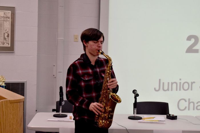 DuBois Area Middle School student Ian Jay plays the national anthem on his saxophone at the start of the junior scholastic challenge