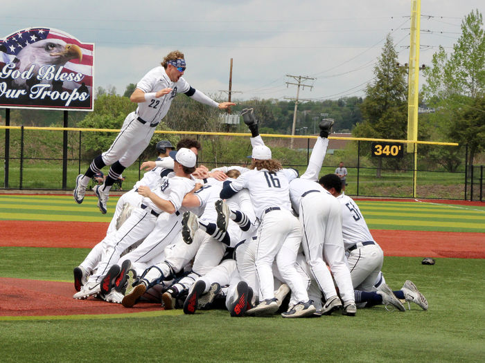 The Penn State DuBois baseball teams celebrates their PSUAC championship with a dogpile near the pitcher’s mound at Showers Field in DuBois.