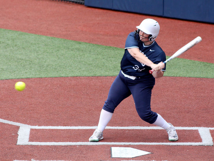 Penn State DuBois senior Chelsea Busatto starts her swing to make contact with a pitch during a recent home game at Heindl Field in DuBois.