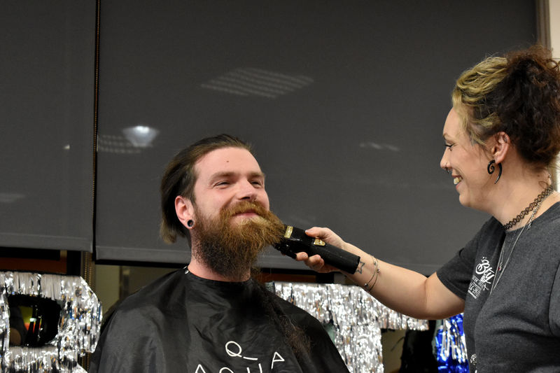 Ray Bolling has his bread buzzed off after his hair was cut during the THON hair auction