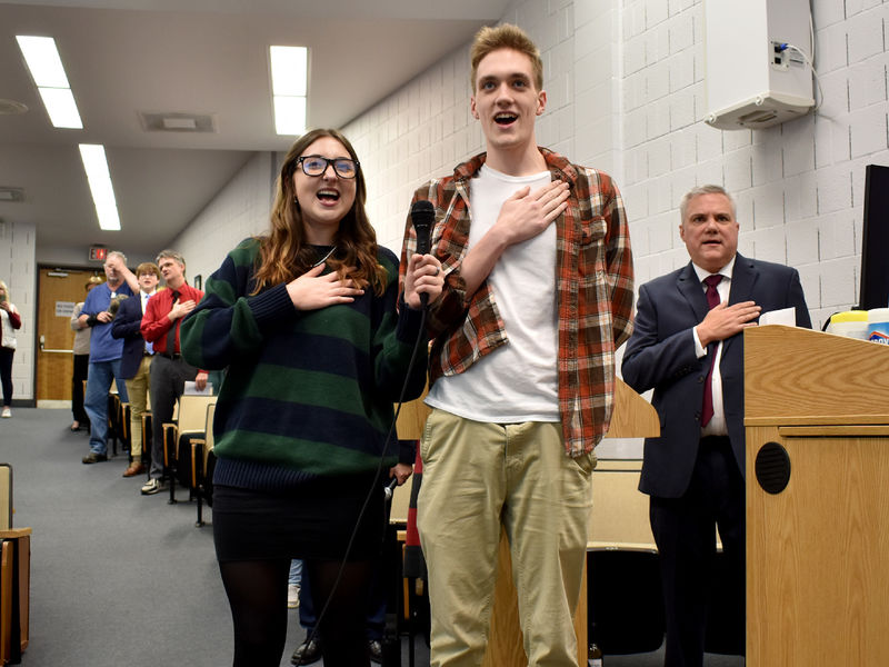 Rowan Mattern, left, and Gavin Taylor from Clearfield Area lead the audience in the signing of the national anthem during the annual Senior Scholastic Challenge, held at Penn State DuBois.
