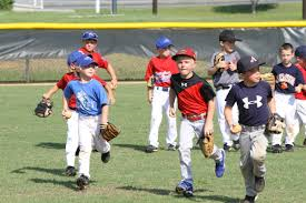 Baseball camp children runnin