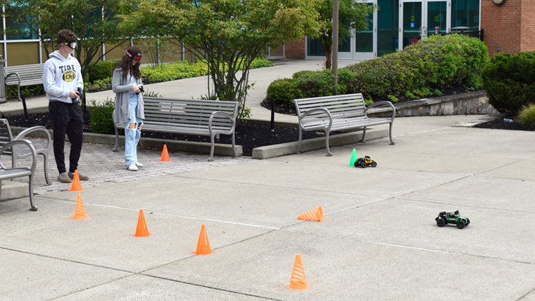 Students wear intoxication goggles and attempt to navigate an RC course to experience the effects of alcohol and other drugs.