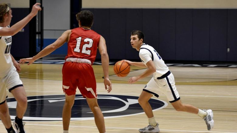 Penn State DuBois junior guard Carter Lindemuth controls the ball with his dribble during a recent game at the PAW Center