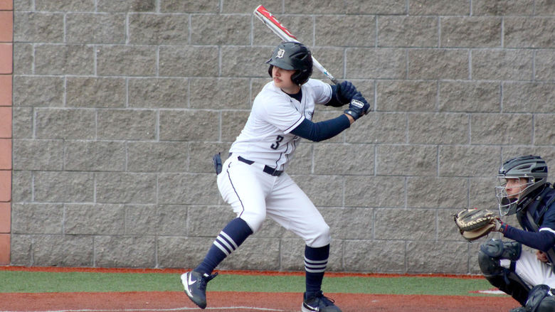 Penn State DuBois senior Cole Breon starts his stride forward to connect with a pitch during a recent home game at Showers Field in DuBois