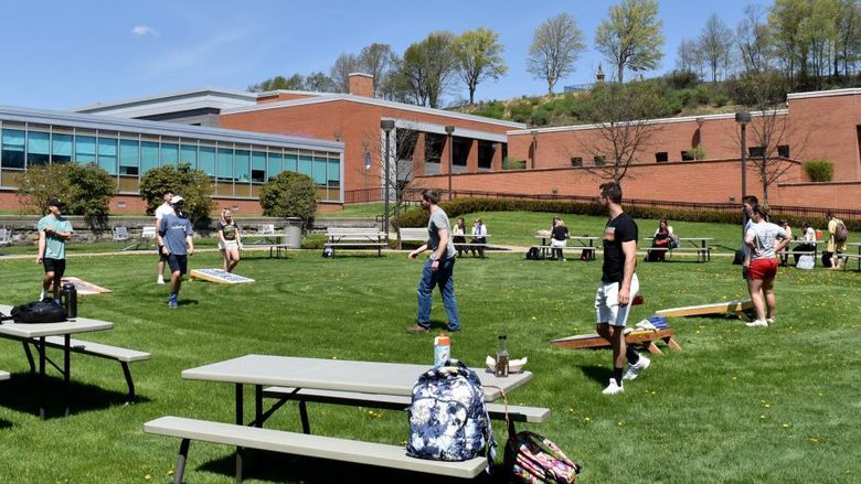 Students at Penn State DuBois enjoy some games outside on the DEF Lawn during the Earth Day celebration on campus