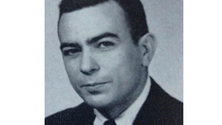 A 1961 yearbook photo portrait of Frank A. Palmerino