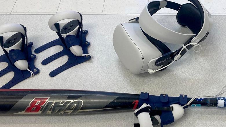 The virtual reality headset and controllers, including one attached to a bat, that are used for baseball and softball hitting practice using software available through the NCPA LaunchBox, powered by Penn State DuBois.