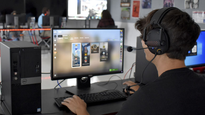 Franklin Lanzoni, IT major, prepares to enter a game of "Counter-Strike: Global Offensive" on one of the gaming computers located in the esports room at Penn State DuBois.