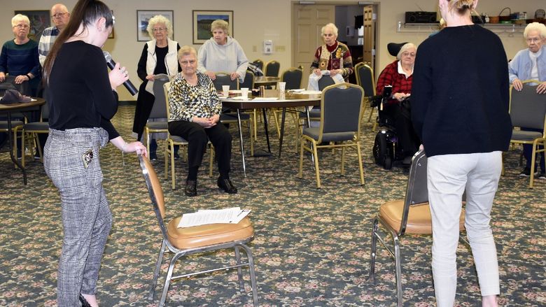 Students demonstrating exercises for balance