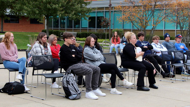 Those in attendance at the victimology event listen and silently reflect upon the testimonials being shared.