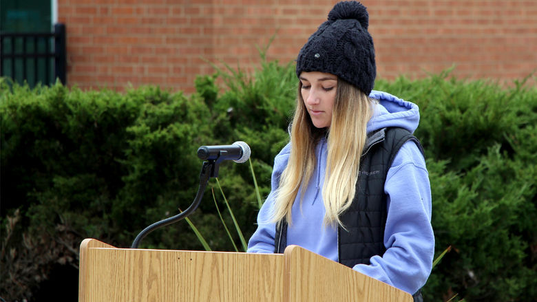 Third year student Lilia Lion reads a testimonial and shares her thoughts during the victimology event at Penn State DuBois.