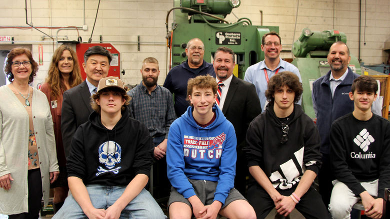 Representatives from Penn State DuBois, Workforce Solutions for North Central Pennsylvania and the Saint Marys Area School District, including the first class of students, who are part of the first offering of the high school die setter program come together for a group photo.