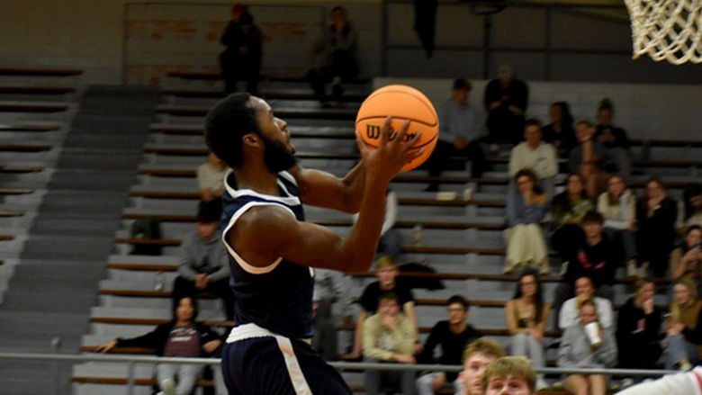 Penn State DuBois senior guard Jaiquil Johnson makes his drive towards the hoop for a layup during a recent game.