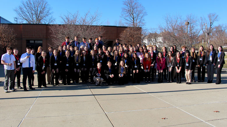 Medal winners from the 2023 Pennsylvania DECA District 1 conference gather at the Schoch Plaza, on the Penn State DuBois campus, following the awards ceremony.