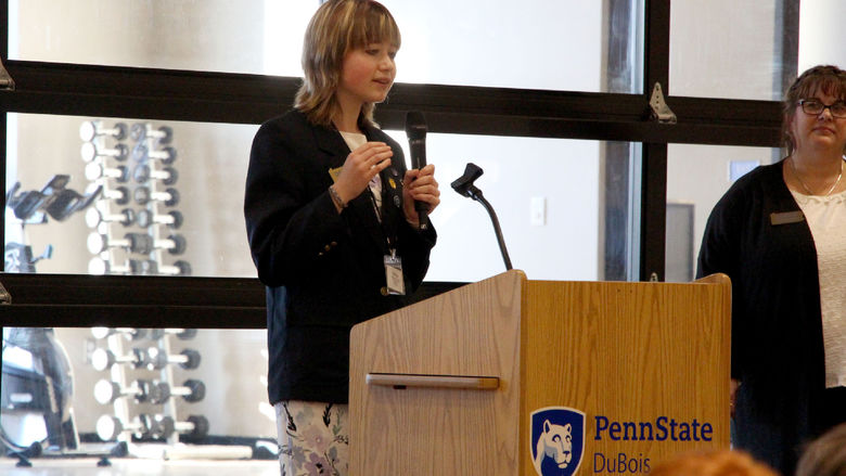 Madigan McGrath, Ridgway student and District 1 representative for Pennsylvania DECA, offers her welcome message at the start of district’s annual conference, held at Penn State DuBois.