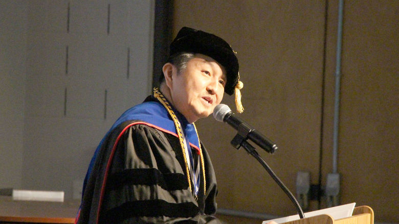 Jungwoo Ryoo, chancellor and chief academic officer, gives his opening remarks during the commencement celebration at Penn State DuBois.