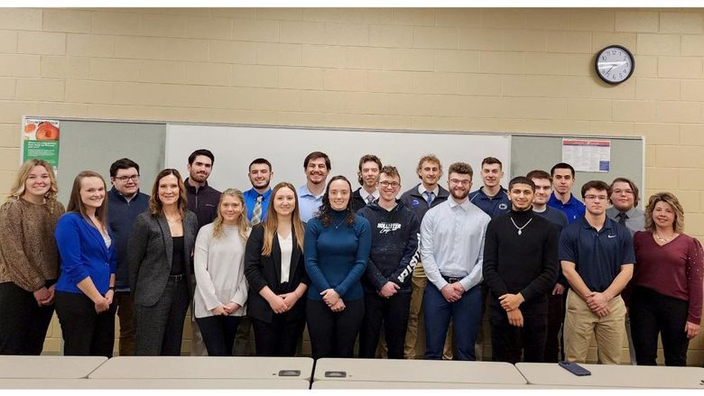 Student presenters gather for a group photo with Laurie Breakey, associate teaching professor of business administration, and Jodi August, executive director of the Greater DuBois Chamber of Commerce and Economic Development, following the conclusion of their presentations at Penn State DuBois.