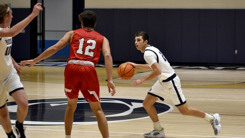 Penn State DuBois junior guard Carter Lindemuth controls the ball with his dribble during a recent game at the PAW Center