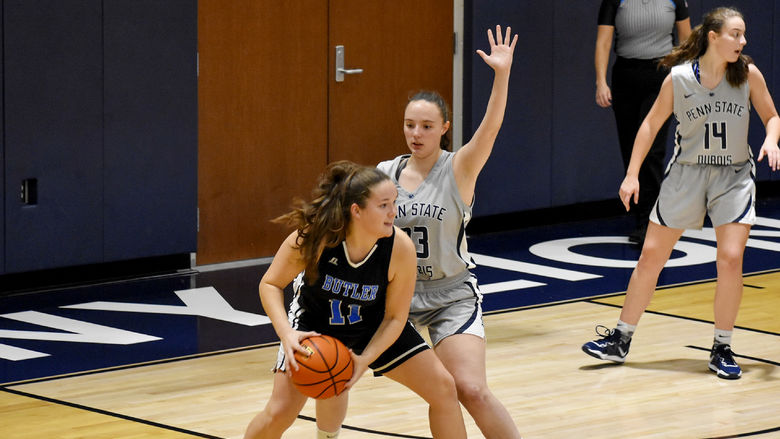Penn State DuBois sophomore forward Tara Leamer holds her strong guarding position on an opponent during a recent game at the PAW Center