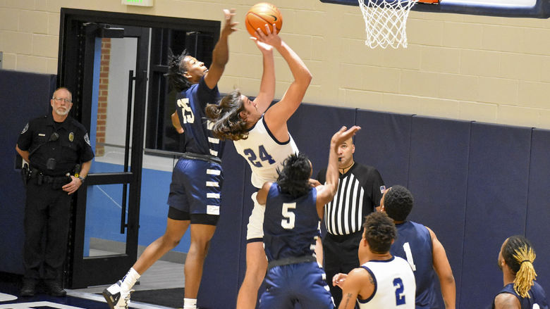 Penn State DuBois freshman center Grant Grimaldi attempts a shot in the paint during a recent game held at the PAW Center