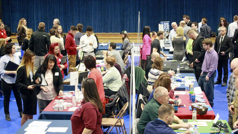 Student, alumni, and community members interact with employers at a previous career fair at Penn State DuBois