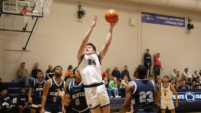 Penn State DuBois freshman Grant Grimaldi pushes up his shot from the paint during a recent home game against Penn State Beaver at the PAW Center