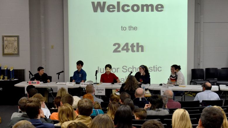 Participants prepare to answer questions during their preliminary round during the junior scholastic challenge in the Hiller Auditorium at Penn State DuBois