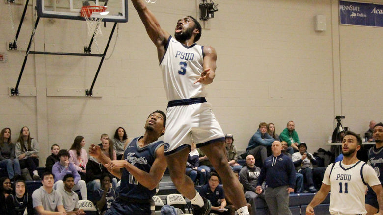 -	Penn State DuBois senior guard Jaiquil Johnson drives and goes up for a layup during a home game this season at the PAW Center, on the campus of Penn State DuBois.