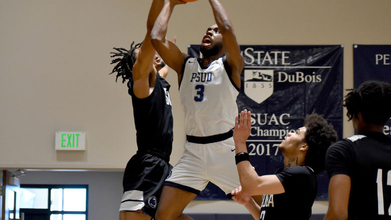 Penn State DuBois senior guard Jaiquil Johnson gets up a contested shot in the paint during a basketball game this season at the PAW Center. Johnson was selected as member of the first team all-conference this year.