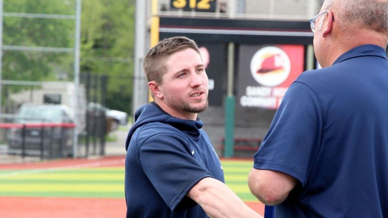 Penn State DuBois baseball coach Garrett Brown prepares to receive his PSUAC championship metal after DuBois won the conference championship in the 2023-24 season. Brown has now been named the new head coach of Penn State DuBois baseball.
