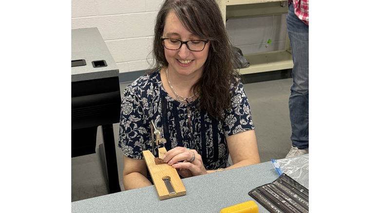 Jewelry making and metalsmithing instructor Bobbi Shaffer Ingram demonstrates a technique during the jewelry making and metalsmithing course at Penn State DuBois.