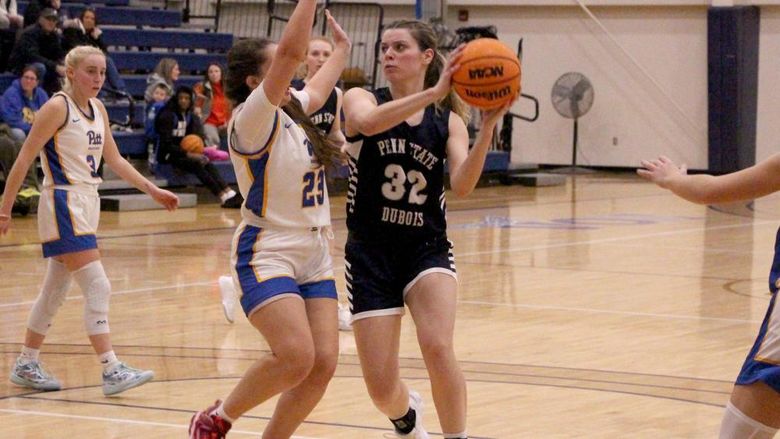 Penn State DuBois freshman forward Elizabeth Hungiville handles the basketball in the lane during a recent game away from home when the Lady Lions visited Pitt Bradford.