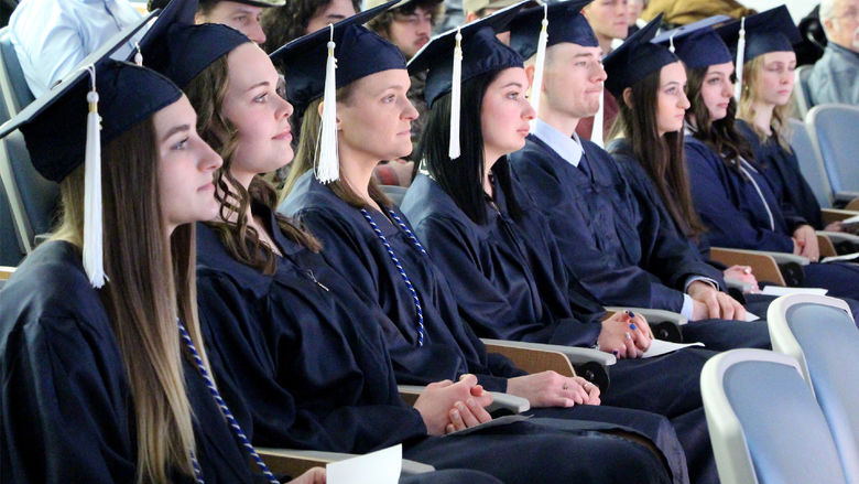 Graduates listen to the speakers during the commencement celebration for the class of fall 2024 at Penn State DuBois.